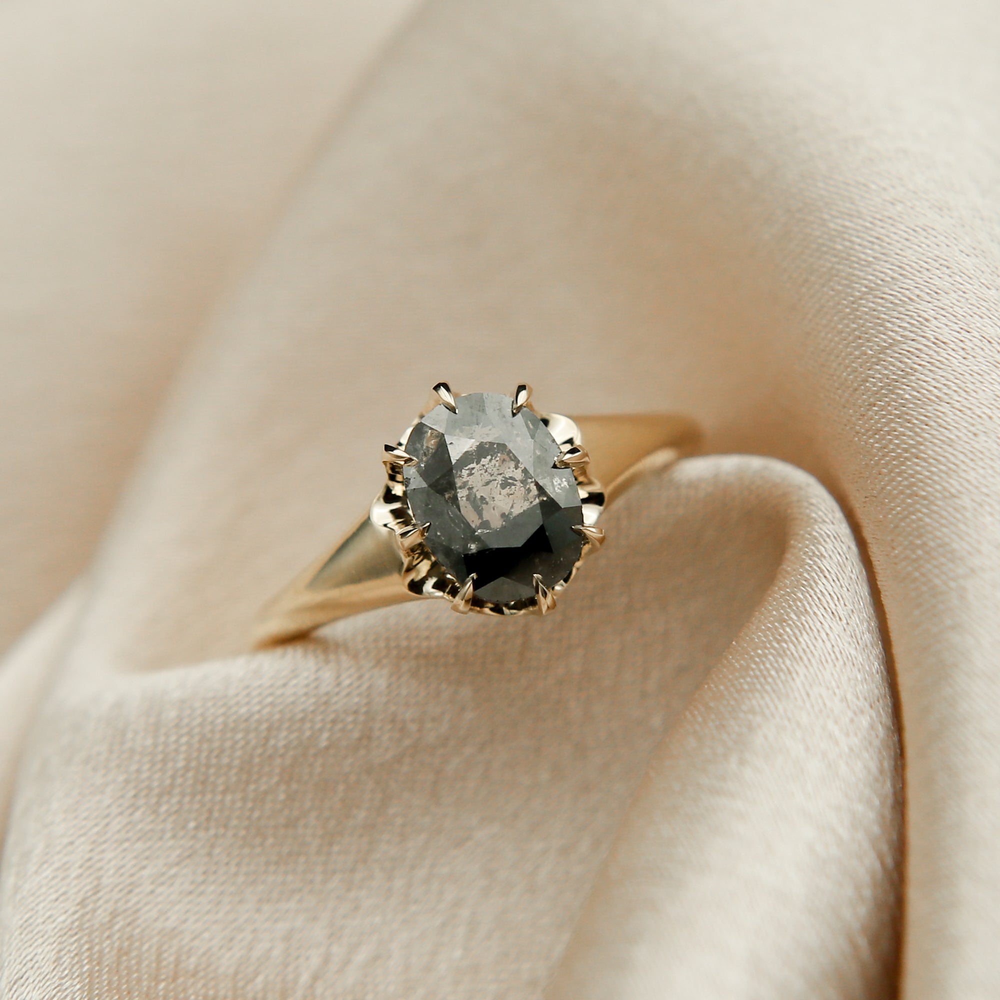 Close up of "amelia" 2 ct salt and pepper diamond ring.
