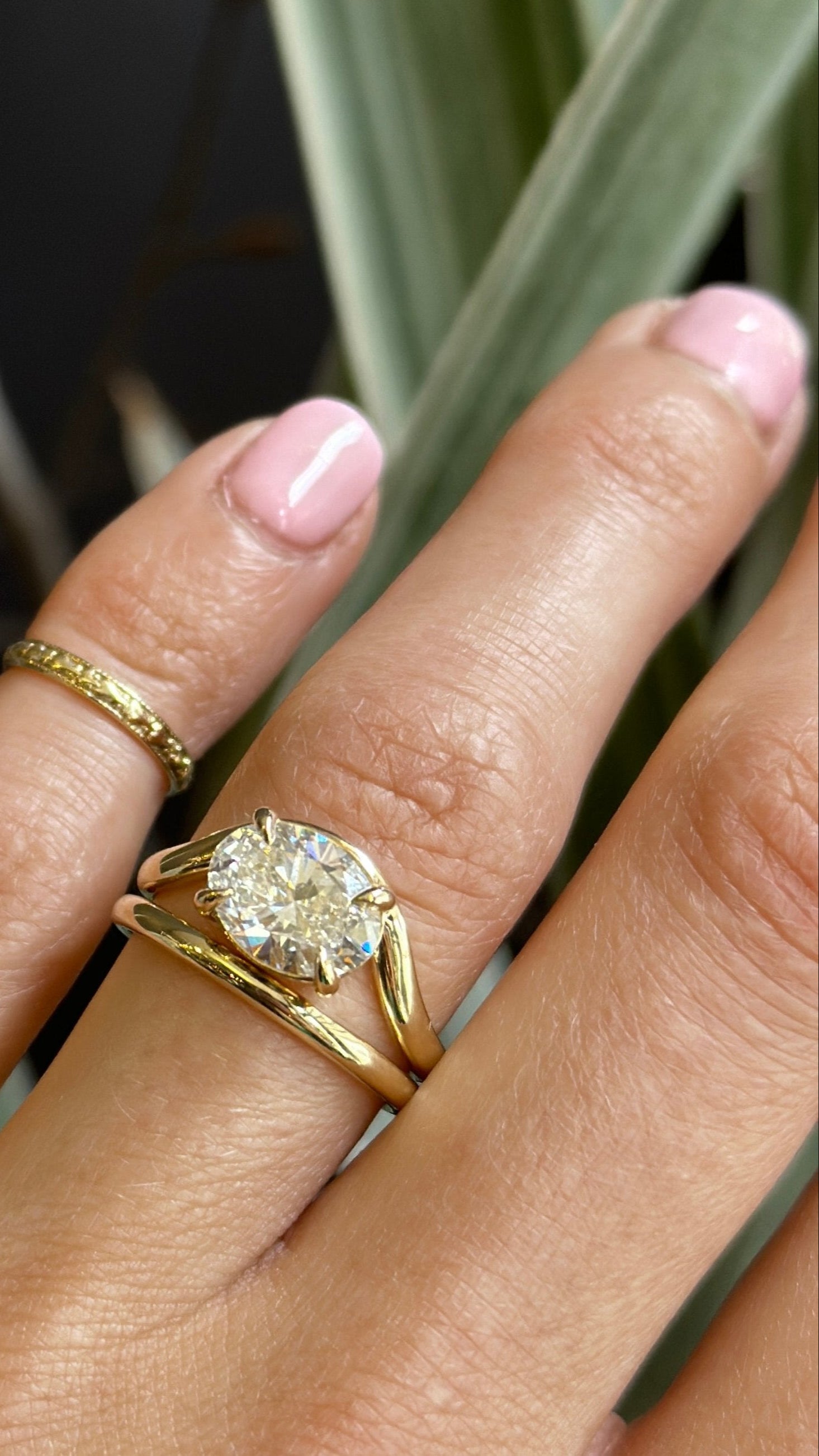 14k yellow gold Oval Diamond Engagement ring with wavy band