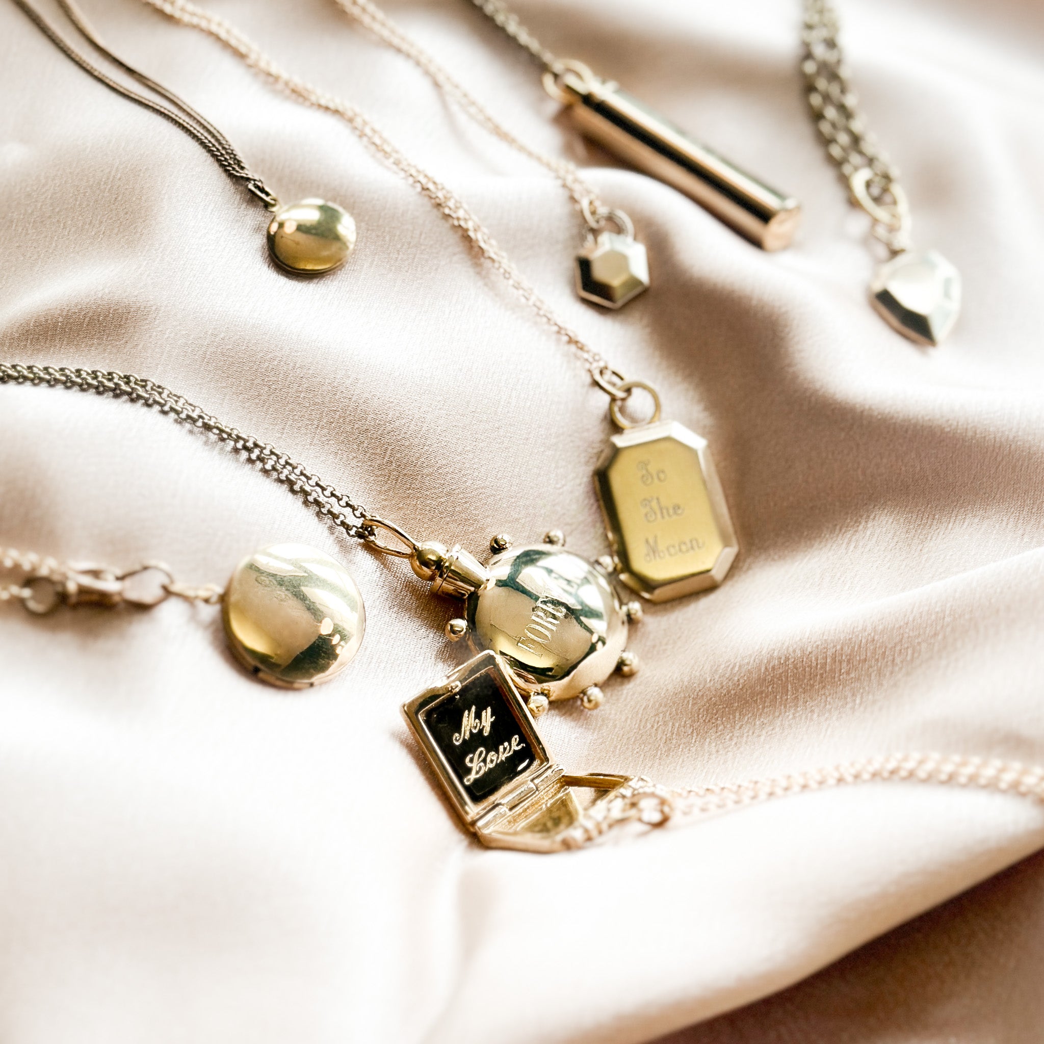 perfume bottle pendant is a container necklace. This engravable desing is a custom made jewelry piece made by local Milwaukee shop Cival Collective