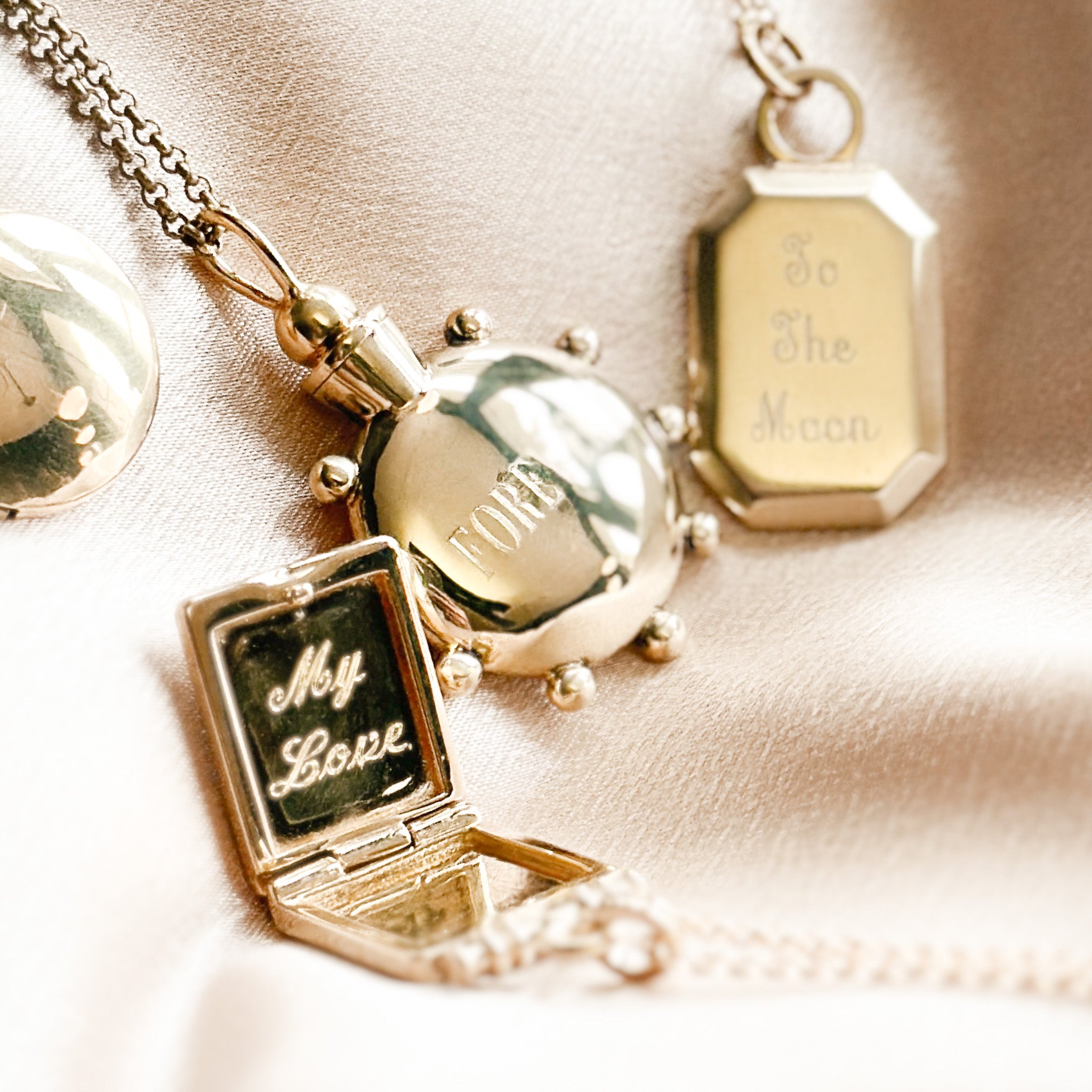 perfume bottle pendant is a container necklace. This engravable desing is a custom made jewelry piece made by local Milwaukee shop Cival Collective
