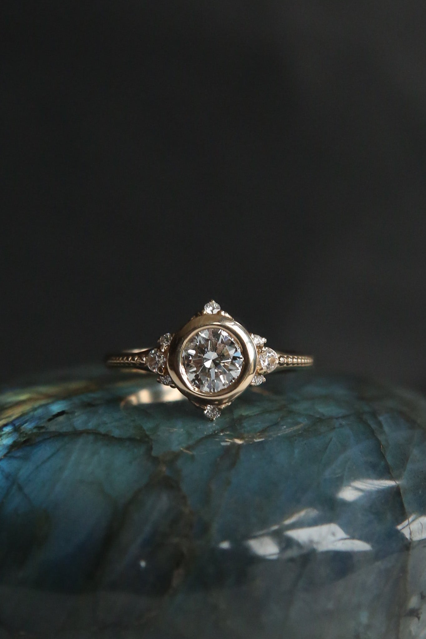 Round brilliant diamond engagement ring with tiny diamond accents - Cival Jewelry Milwaukee