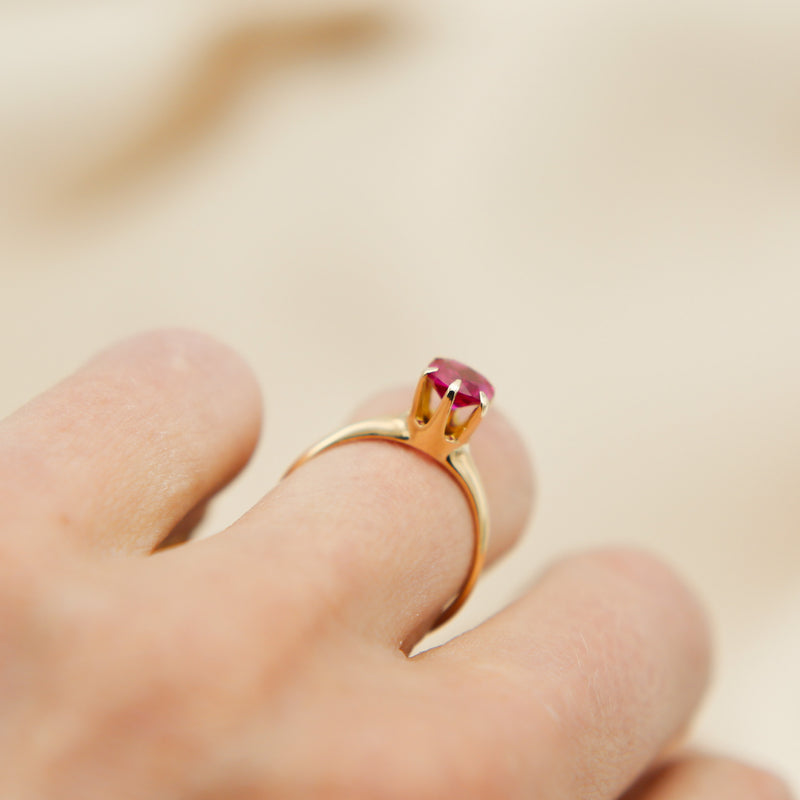 high mounted ruby ring on hand