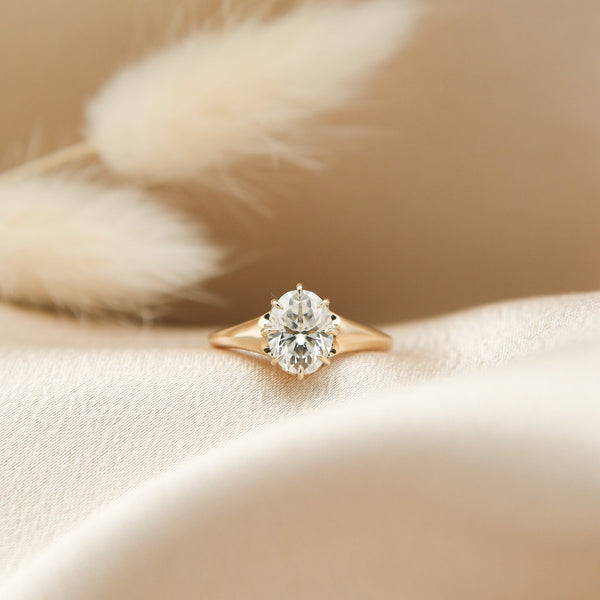 14K gold 2ct moissanite ring designed by Rae Frye and Nina Palacio of Cival Collective.