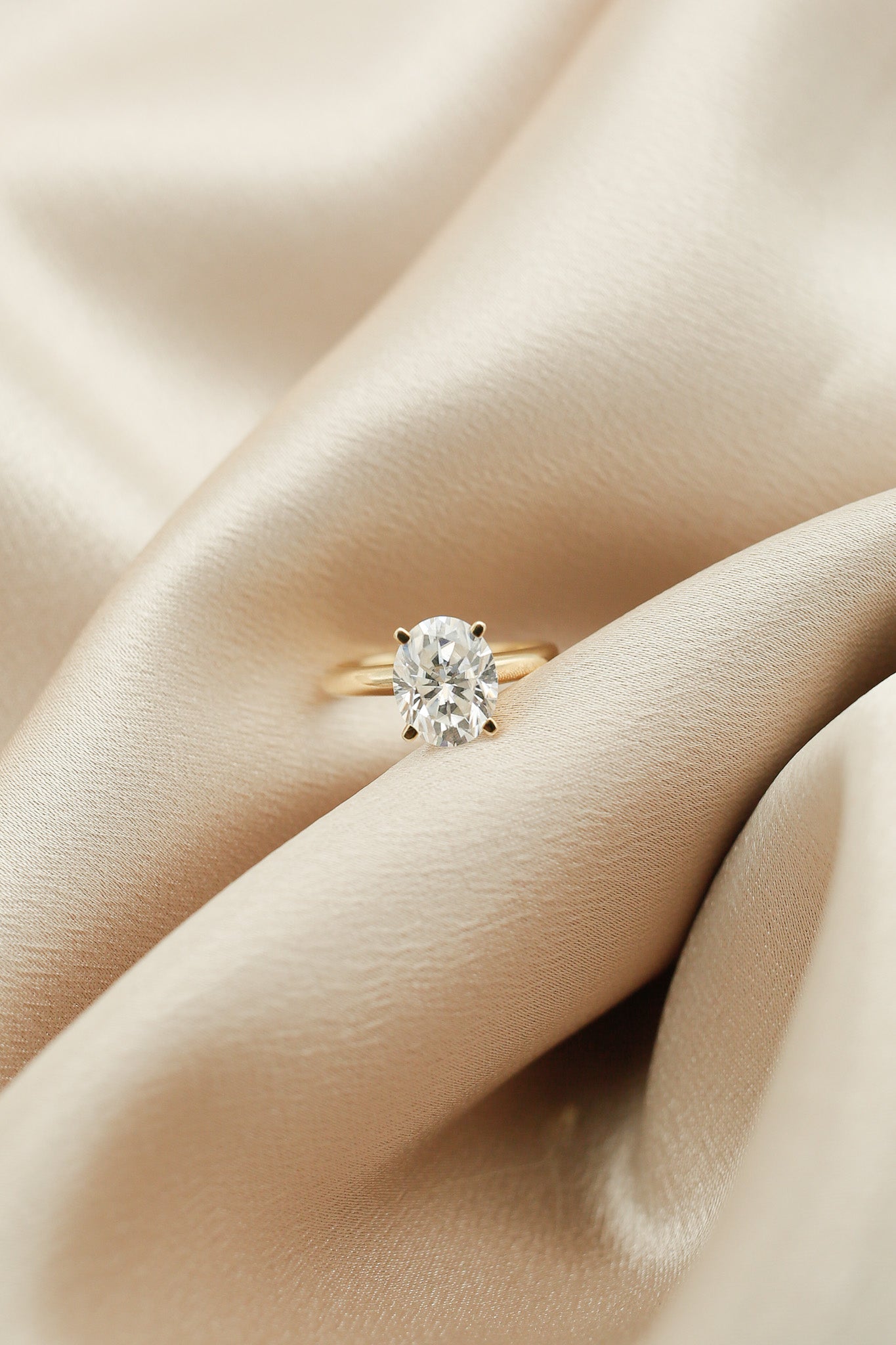 3ct oval solitaire yellow gold engagement ring by Cival Jewelry shop Milwaukee