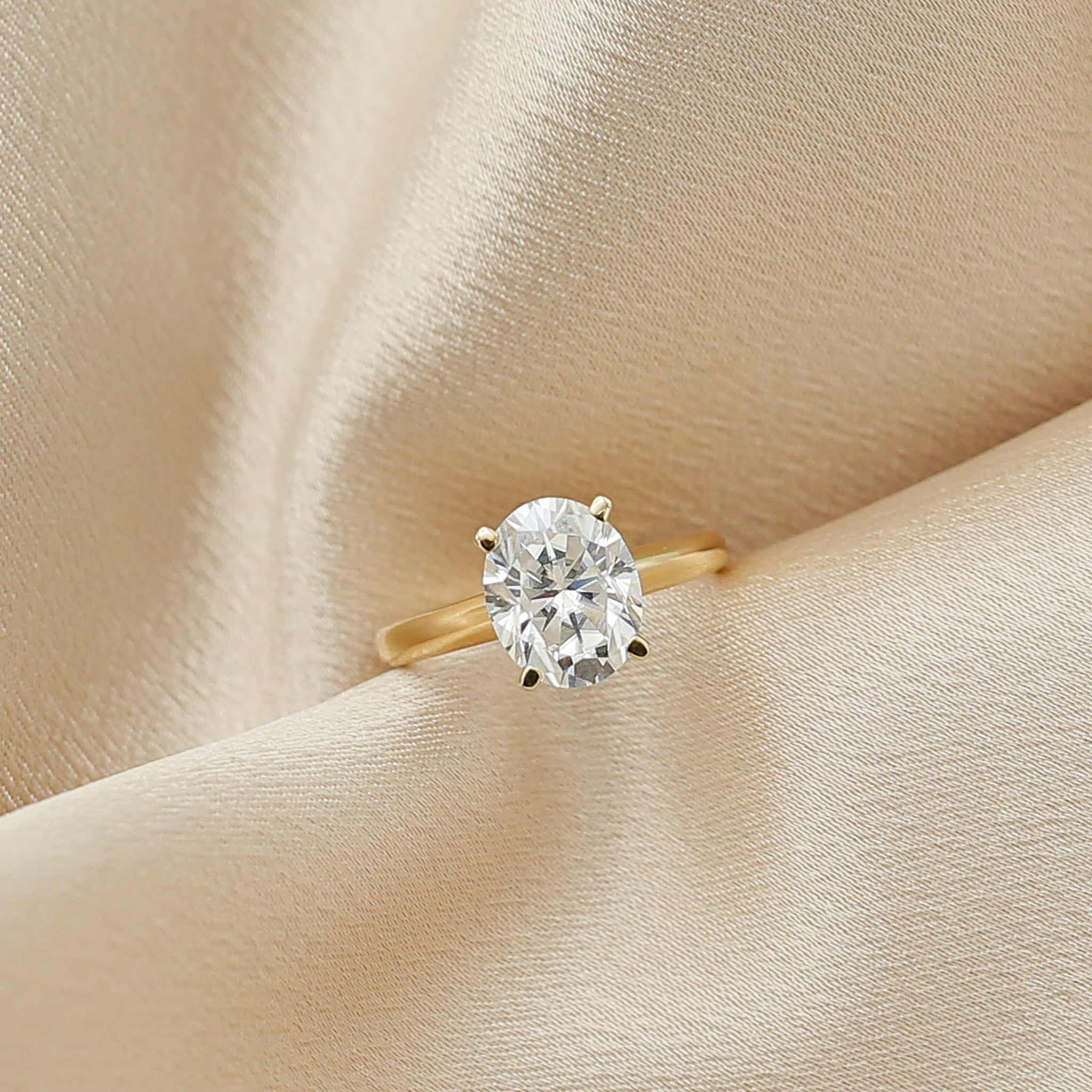 3ct oval solitaire yellow gold engagement ring by Cival Jewelry shop Milwaukee