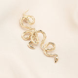 Twisting snake earrings designed by Milwaukee creative jewelry company Cival 