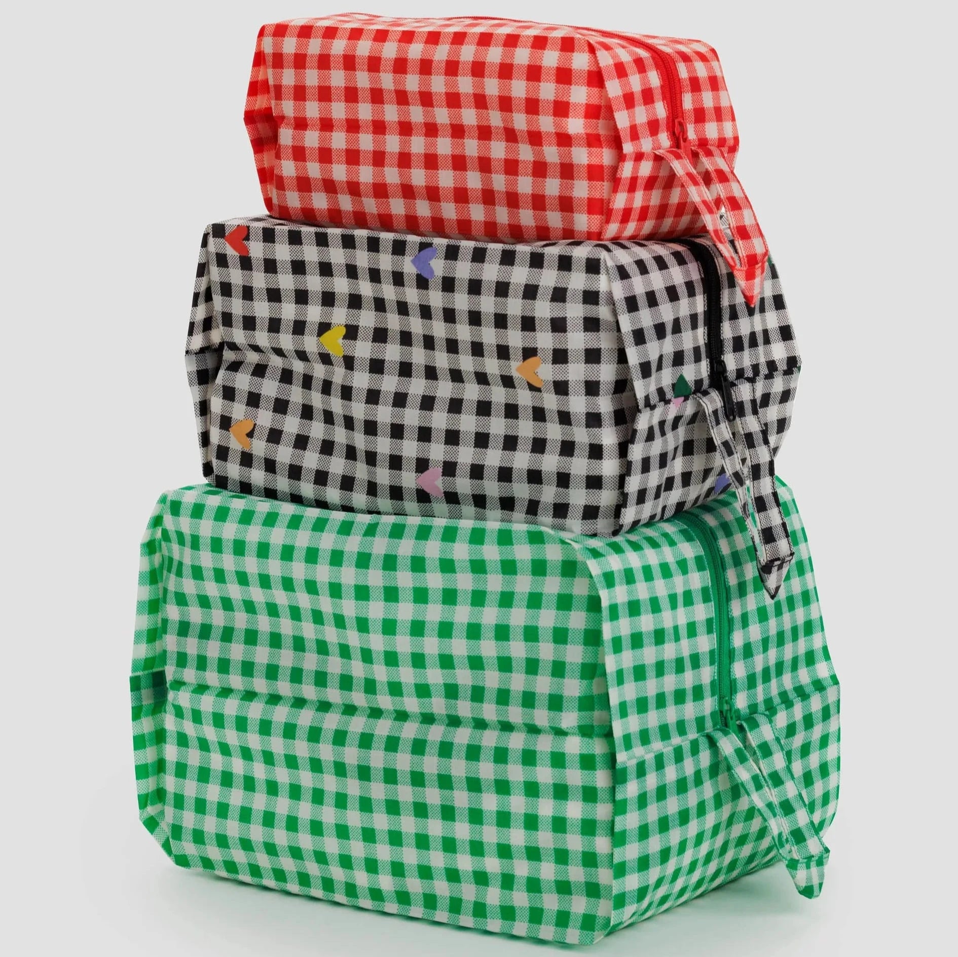 close up of all three stacking gingam zipper pouches.