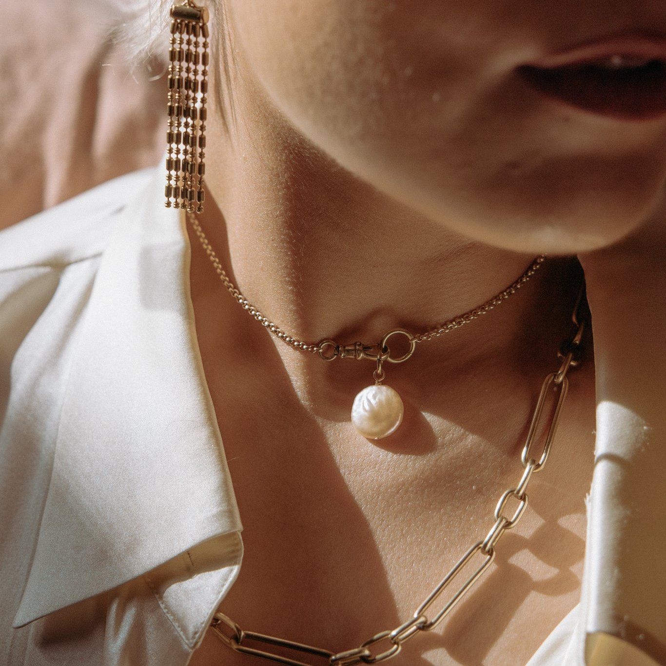 Coin peal pendant t on a gold fill chain with a brass swivel clasp - Cival Jewelry Milwaukee