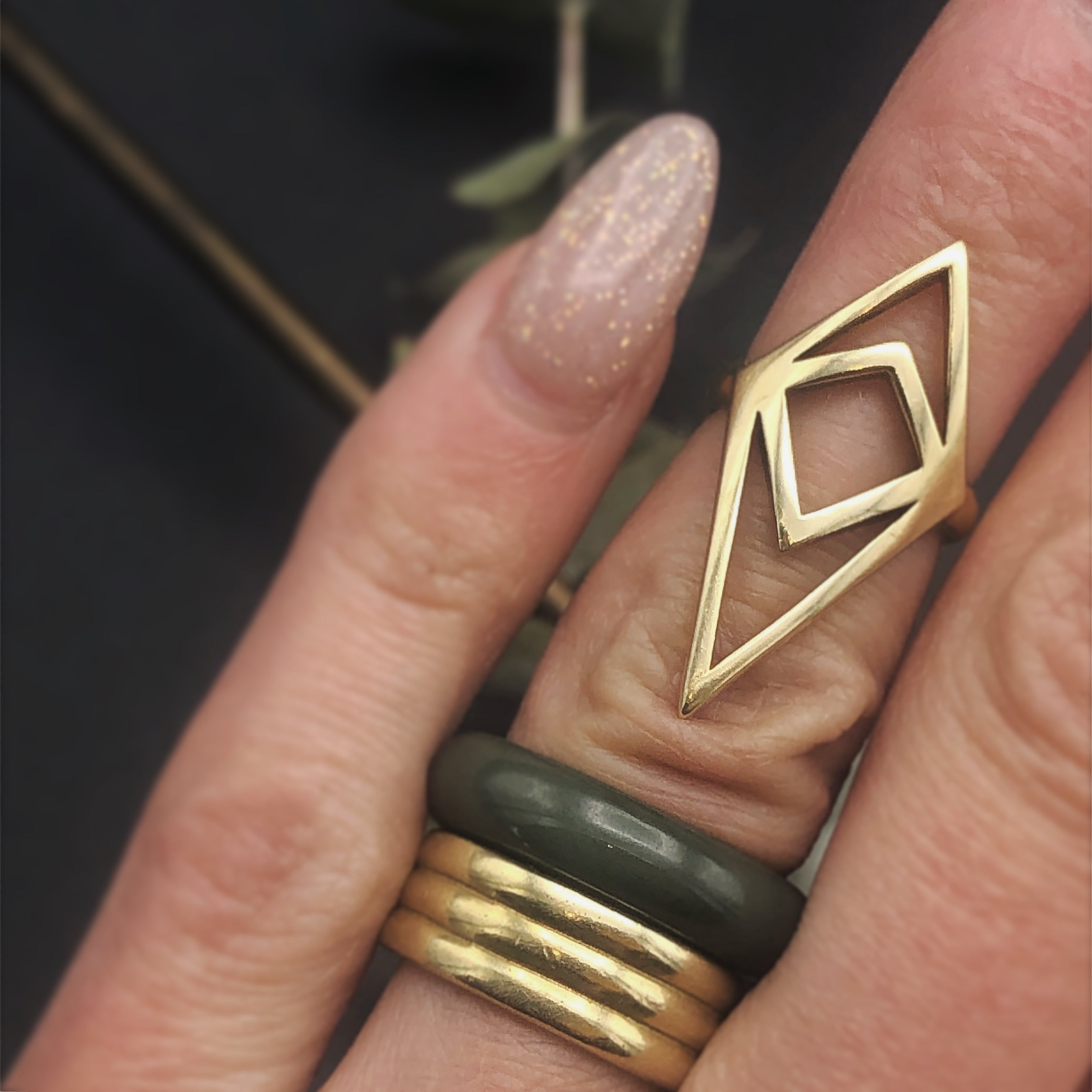 Natural imperial hand carved jade stacking ring by Milwaukee Jewelry Design studio Cival Collective.