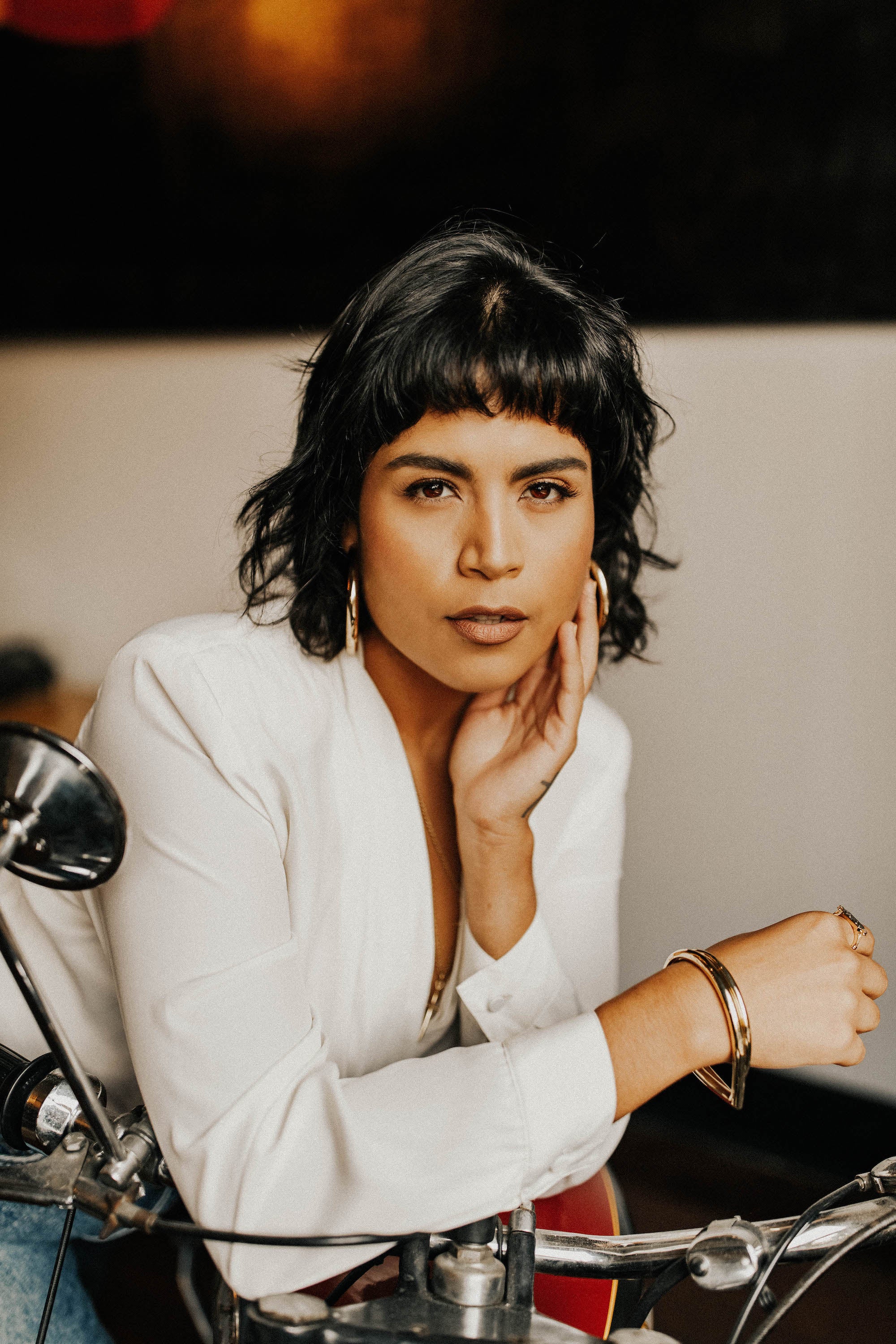 model wearing brass bangle