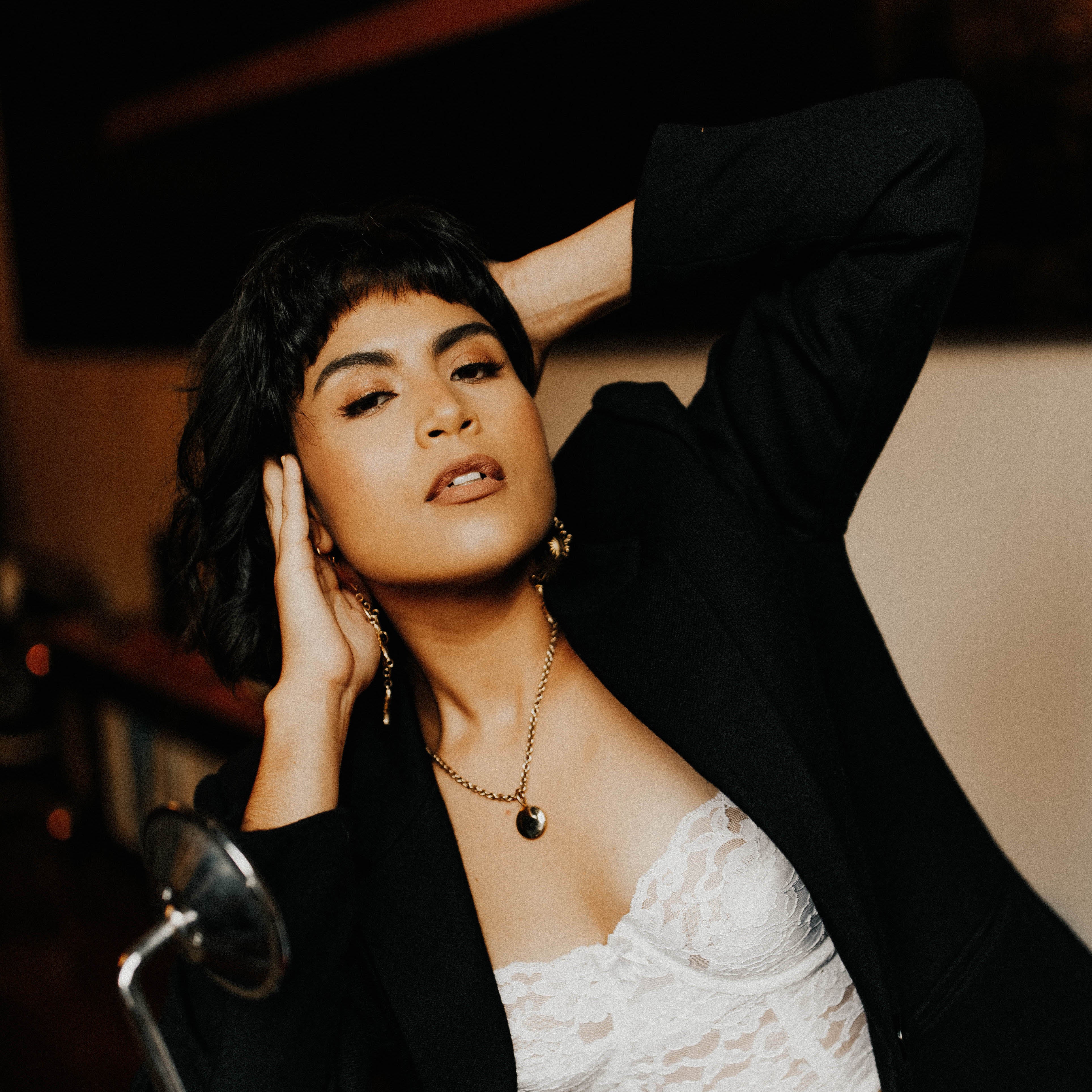 Large Brass Locket Necklace featured on a model at Cival Collective, Milwaukee WI