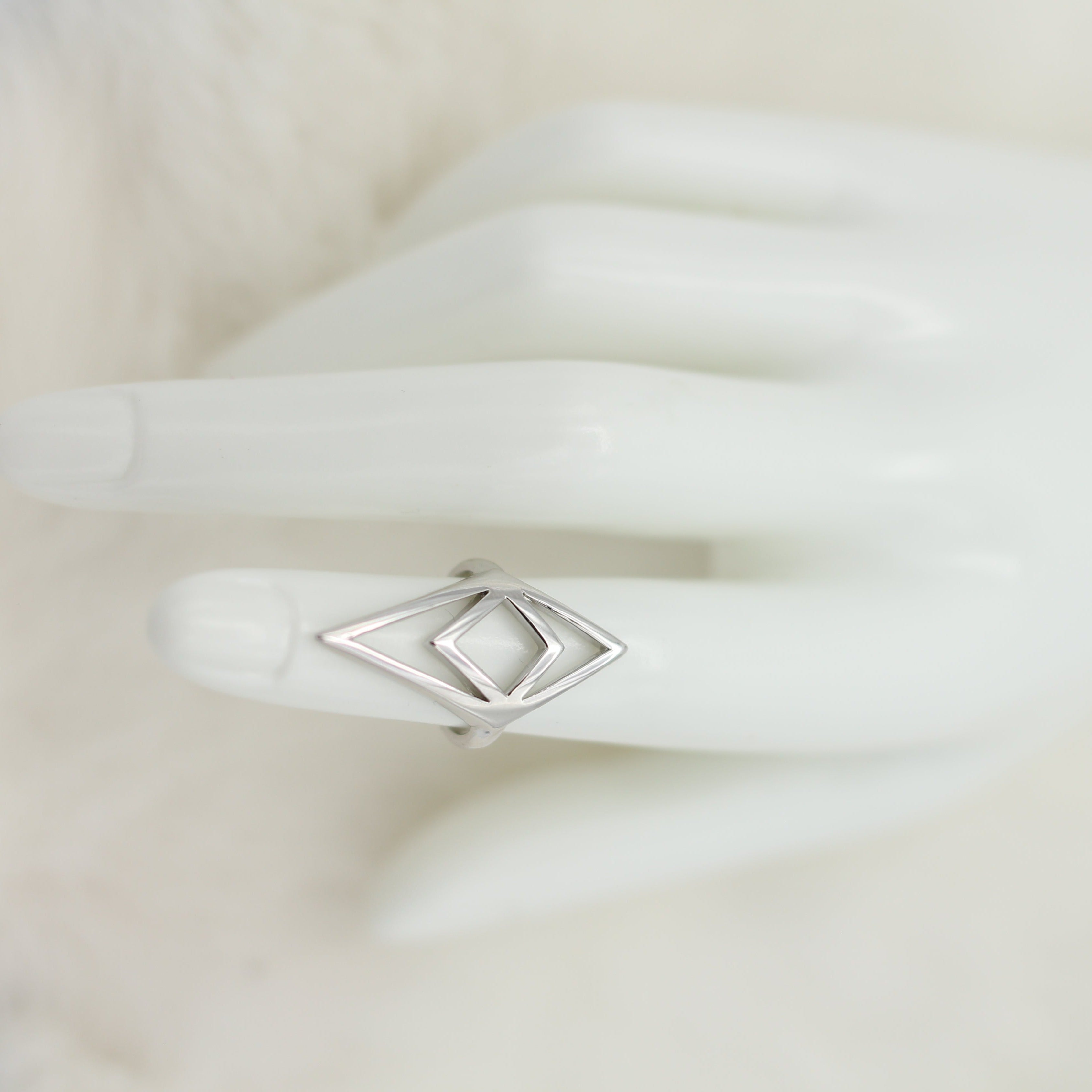 Brass cast midi ring by Milwaukee jewelry designers Cival collective. Form and function combined in this beautiful midi ring. Designed for tab top opening makes this the perfect bartender accessory.