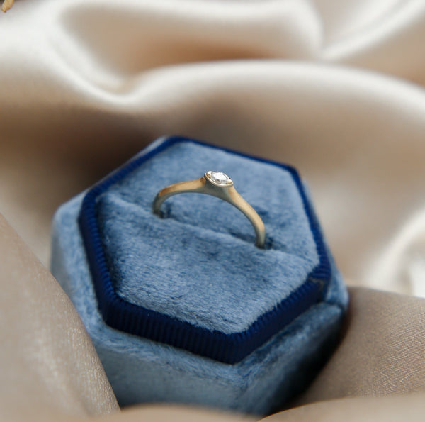 Yellow gold ring with east west marquise diamond simple and modern design