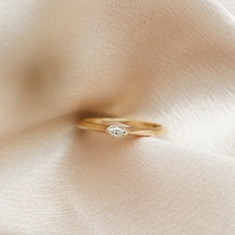 14k Yellow gold ring with east west marquise diamond simple and modern design