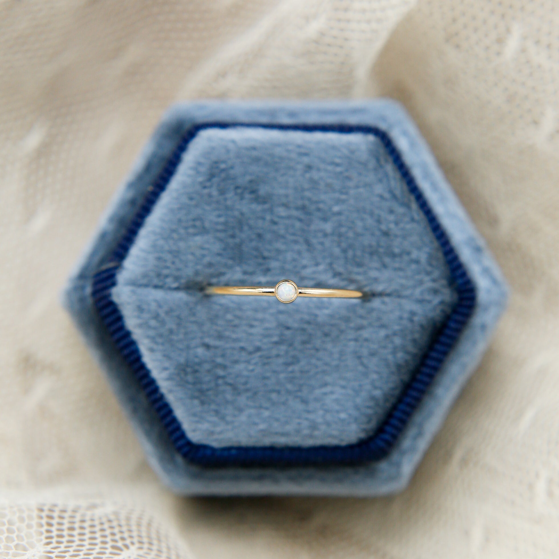 close up photo of gold stacking ring