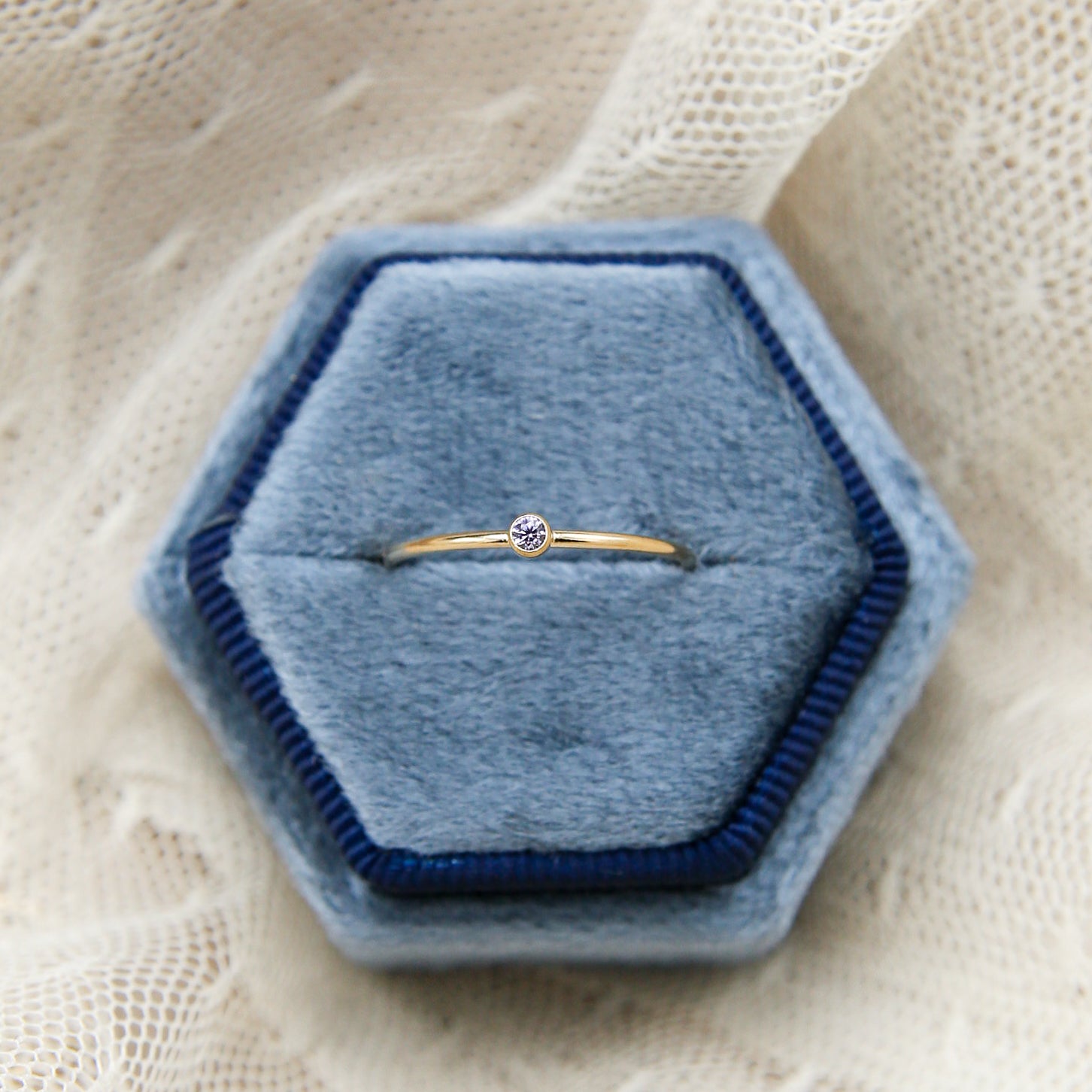 close up photo of gold stacking ring