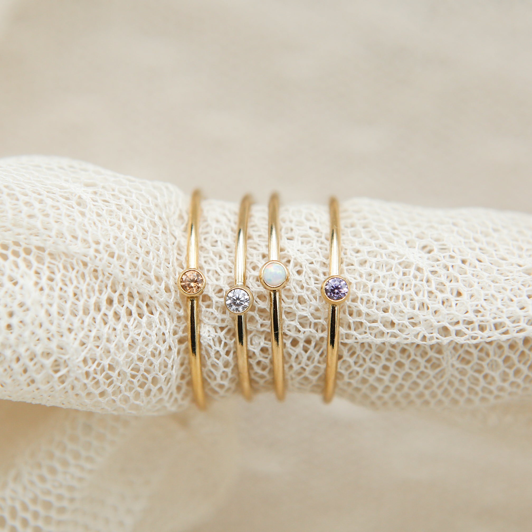 close up photo of gold stacking rings