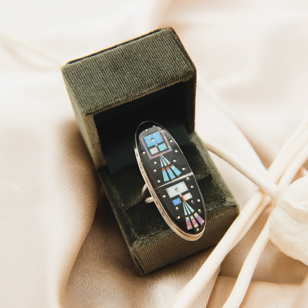 Close up of space party inlay ring. opal, onyx and turquoise 
