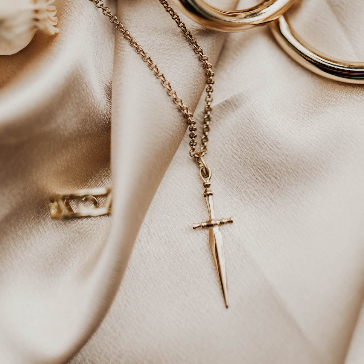 Brass cast knife necklace from Cival Collective, a jewelry store in Milwaukee WI