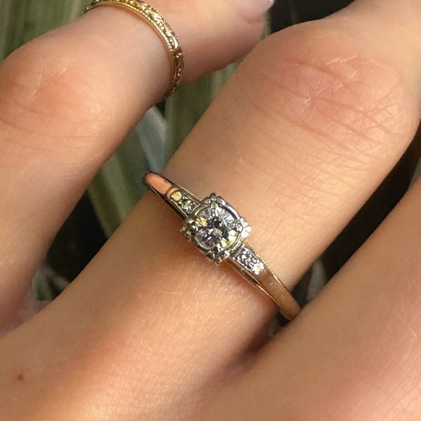At the heart of this Ladies Two Tone Engagement Ring is a 4mm 0.25 carat round brilliant cut natural diamond with petal style prongs making it incredibly unique.&nbsp;