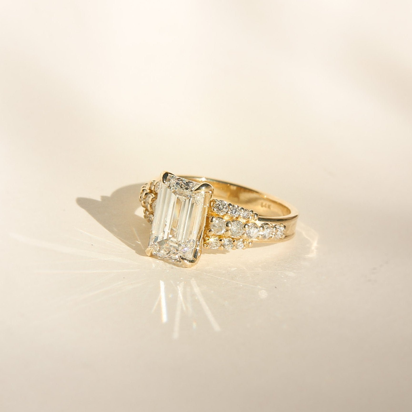 Elongated emerald cut diamond engagement ring by cival 