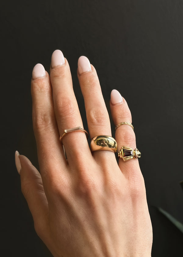 Multiple rings on hand 10k rose gold modern simple straight bar ring with moissanite baguette 