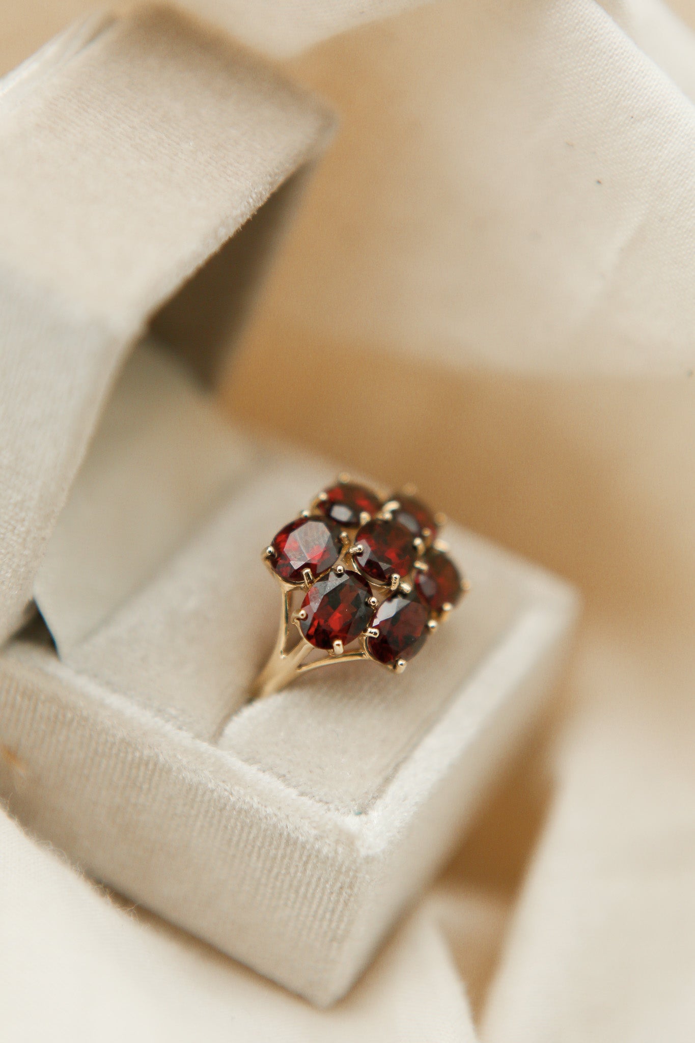 Vintage 10K garnet cluster ring with prong set oval stones - Cival Jewelry Milwaukee WI