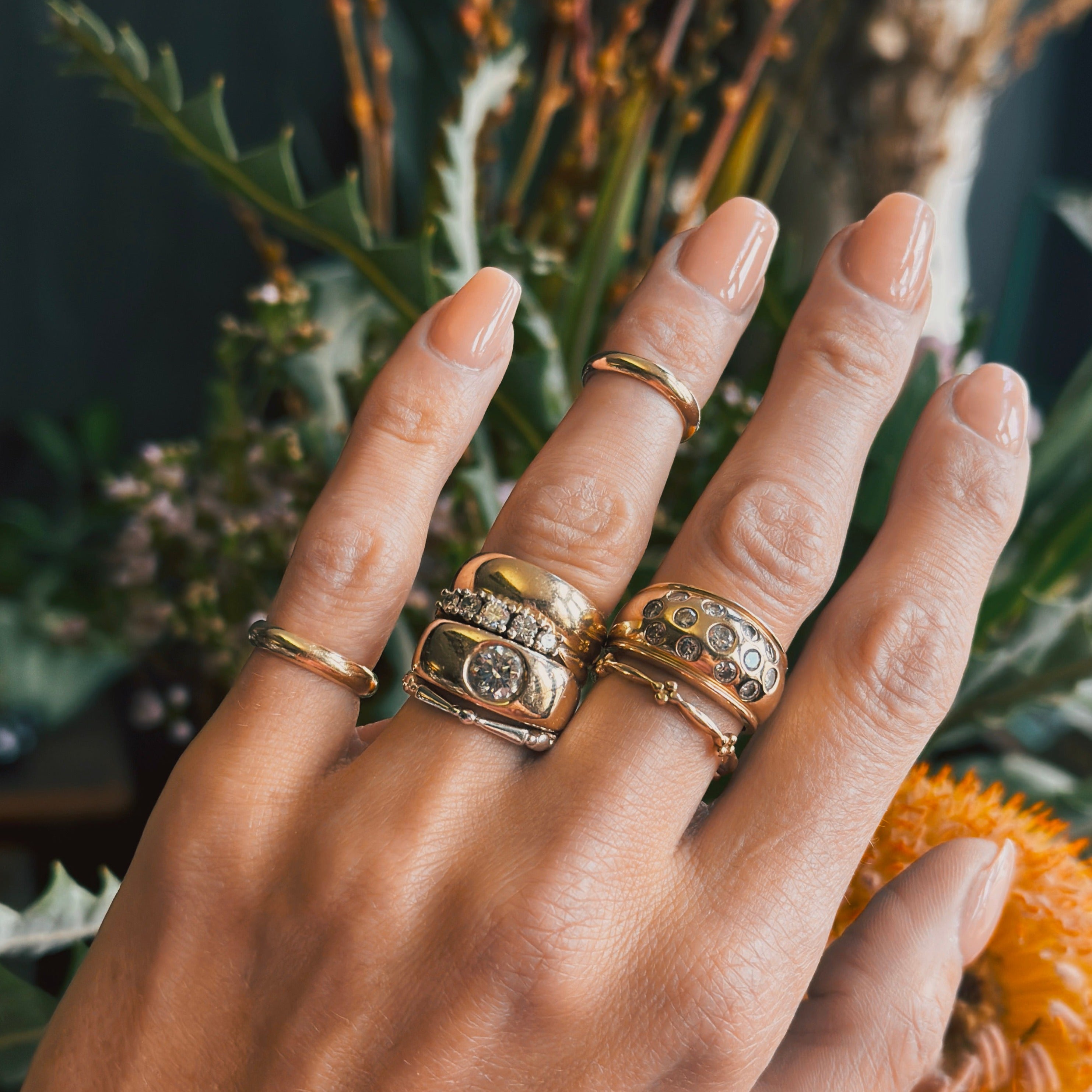 collection of gold fill midi rings modeled on hand