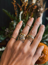 Beautiful stack of handmade rings all designed by Cival Collective - a hip Jewelry store in Milwaukee WI. 
