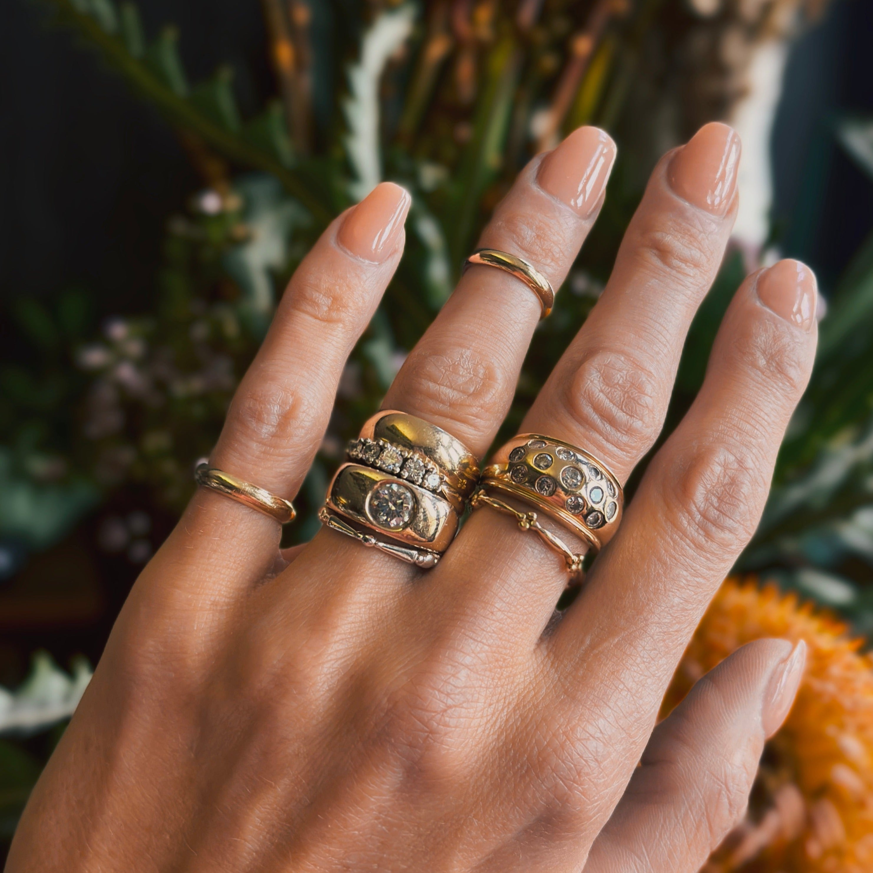 14k yellow gold stacking rings with diamonds by cival collective Milwaukee Jewelry design store and studio