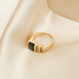 Vintage 14k yellow gold structural  emerald cut blue sapphire ring with two rows of white diamonds