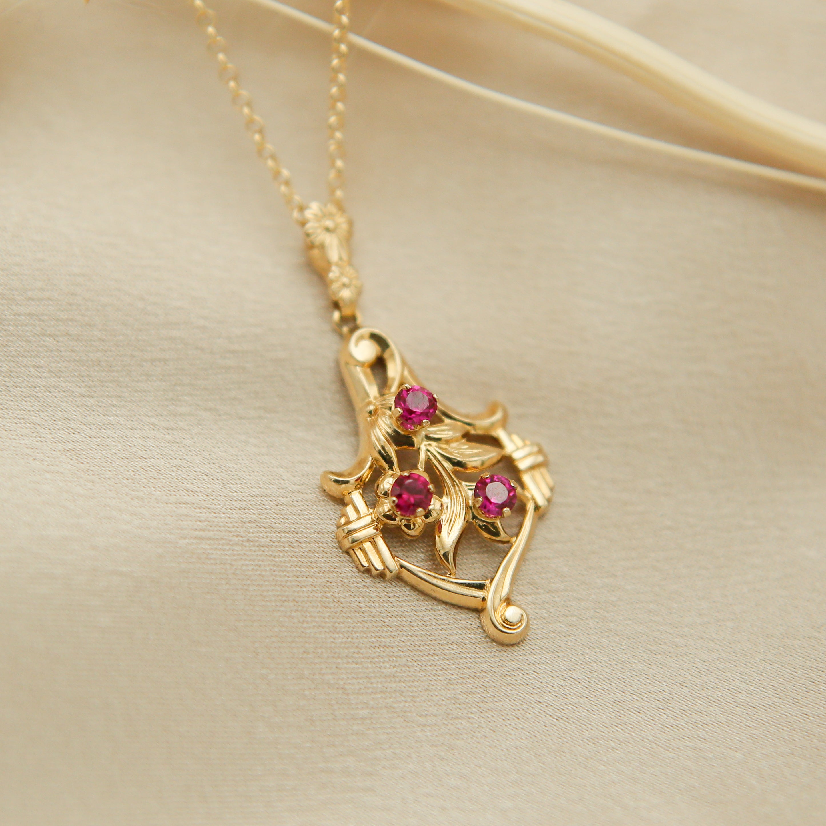 10k Midcentury Floral Crest Pendant with Rubies