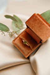 Alternative bride design by unique jewelry shop Cival in Milwaukee Wi Unique yellow gold antique engagement ring fully restored and reset with a green gemstone