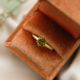 Antique yellow gold prong set engagement ring with green tourmaline handmade in Milwaukee WI by local Jewelry shop Cival