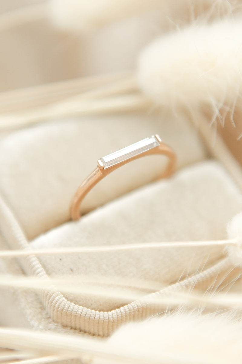 10k rose gold modern stacking ring with straight bar set moissanite baguette  by local milwaukee jewelry designers Cival Collective