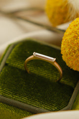 10k rose gold modern simple straight bar ring with moissanite baguette  in velvet box