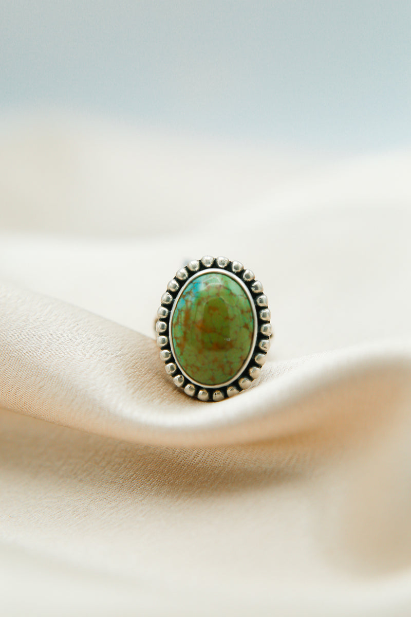 Royston turquoise oval ring with traditional silver detail