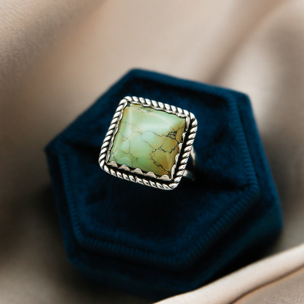 Sterling silver ring with a one of a kind, vintage hand cut green Royston turquoise square stone.