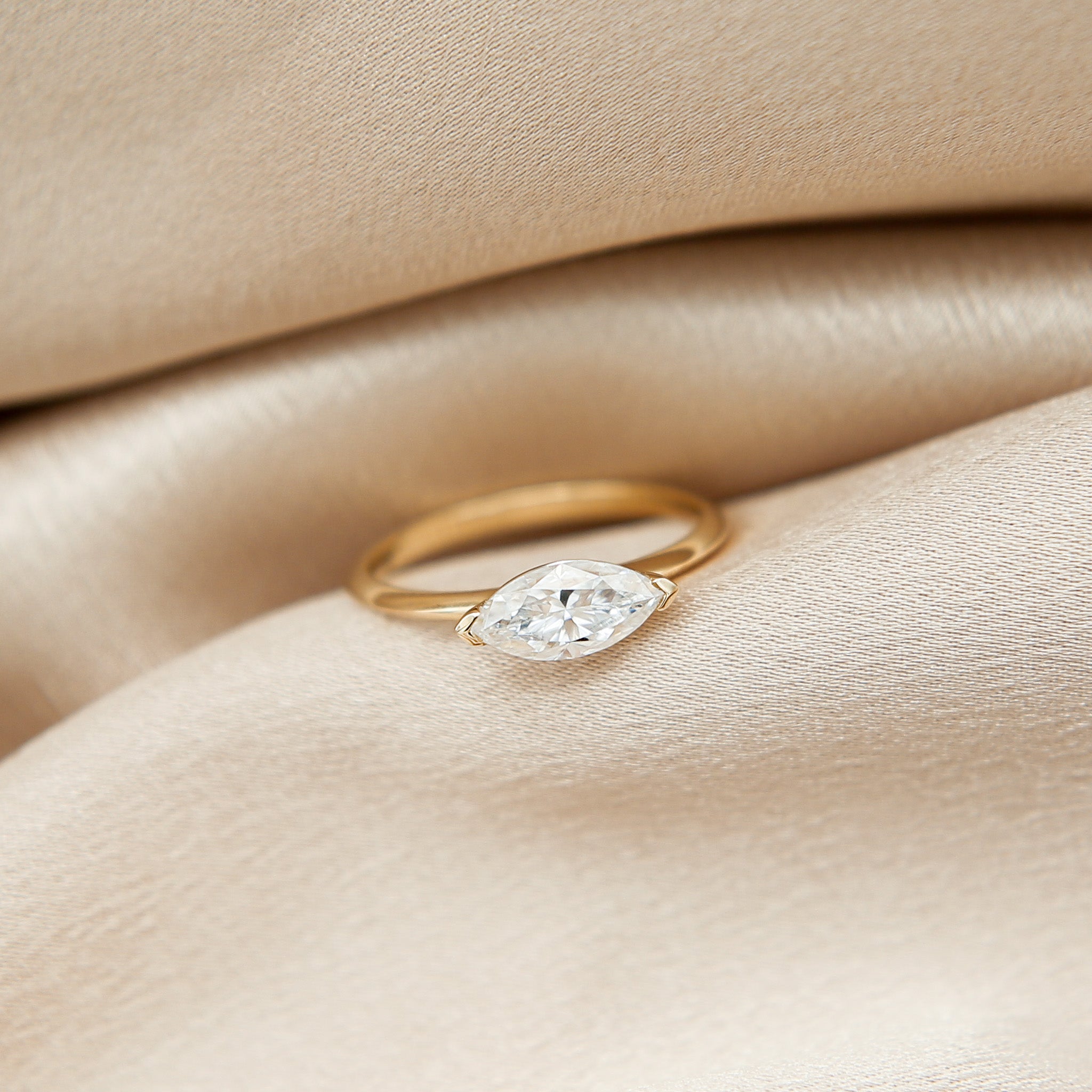 10k East-West Marquise Moissanite Ring