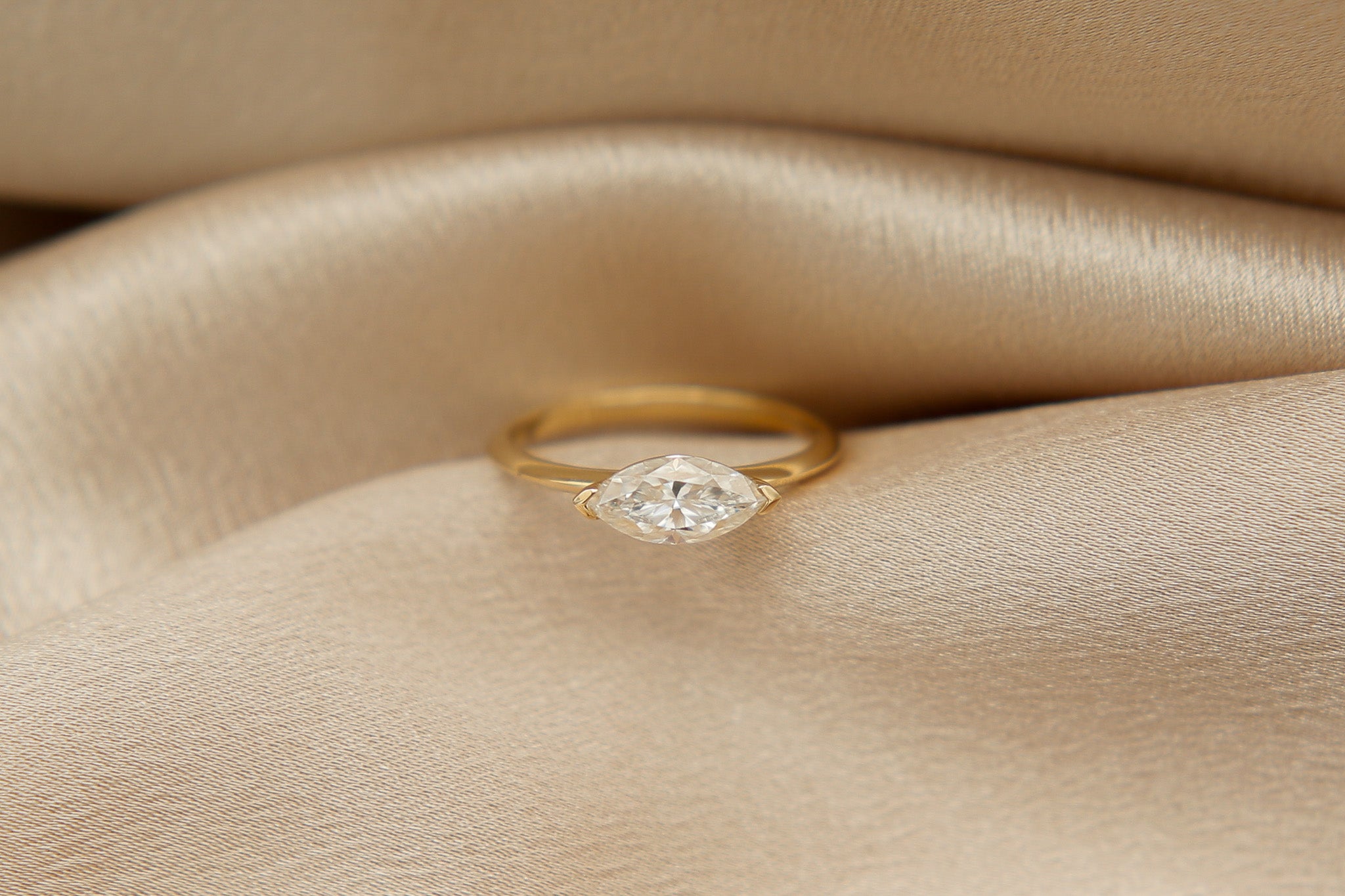 10k East-West Marquise Moissanite Ring