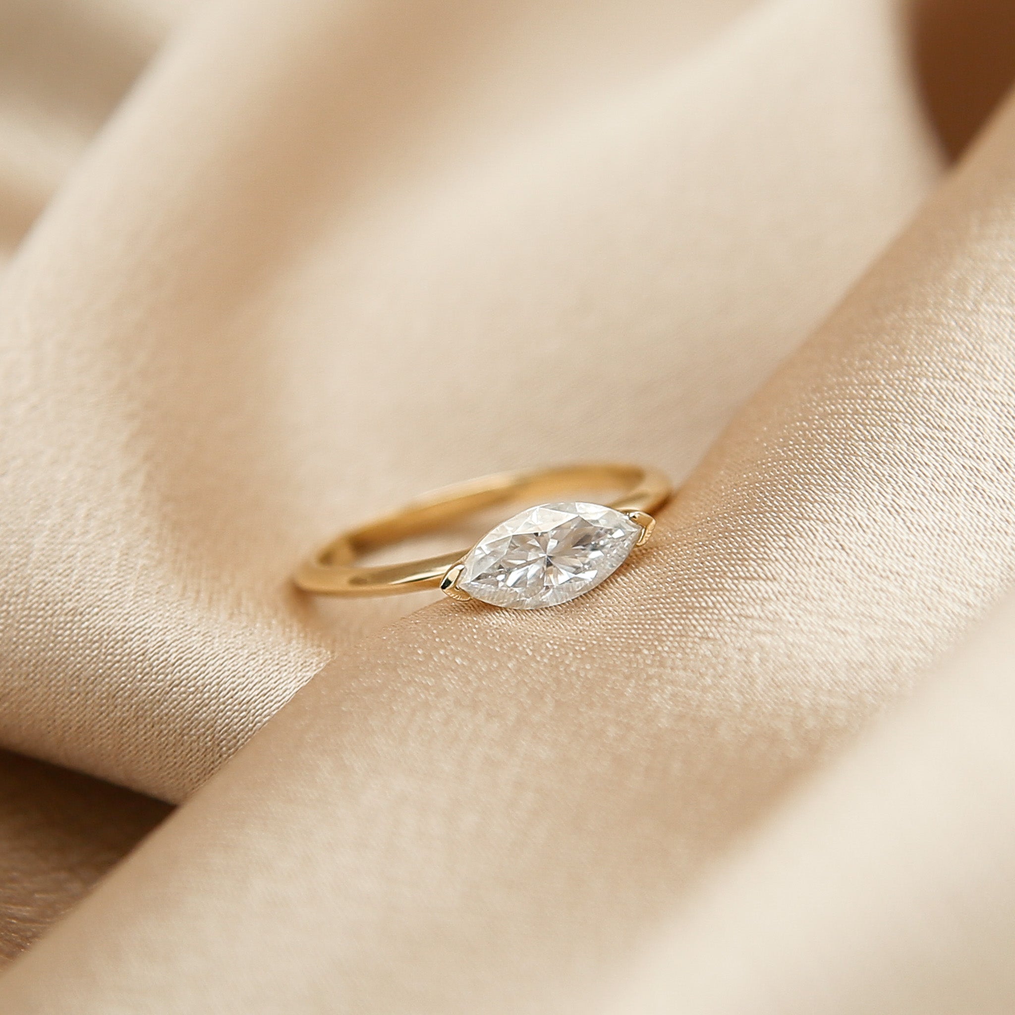 10k East-West Marquise Moissanite Ring