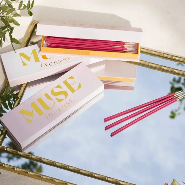 pink colored incense sticks, box labeled "muse incense" 