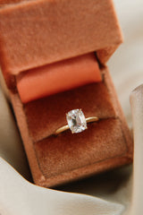 2ct Antique Cushion cut moissanite diamond engagement ring on a yellow gold band, by Unique Milwaukee Jewelry Store Cival Collective. Expertly crafted gold ring stacks with any style wedding band.
