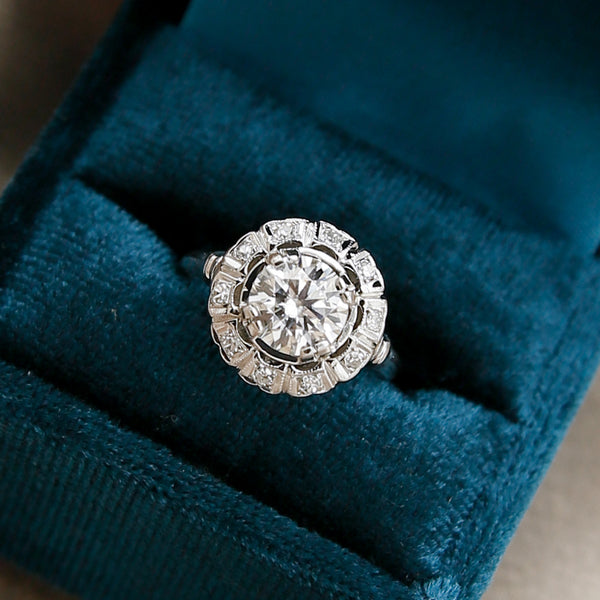 close up of vintage 1960's halo ring in ring box. 1.2 ct moissanite stone size is 5.25