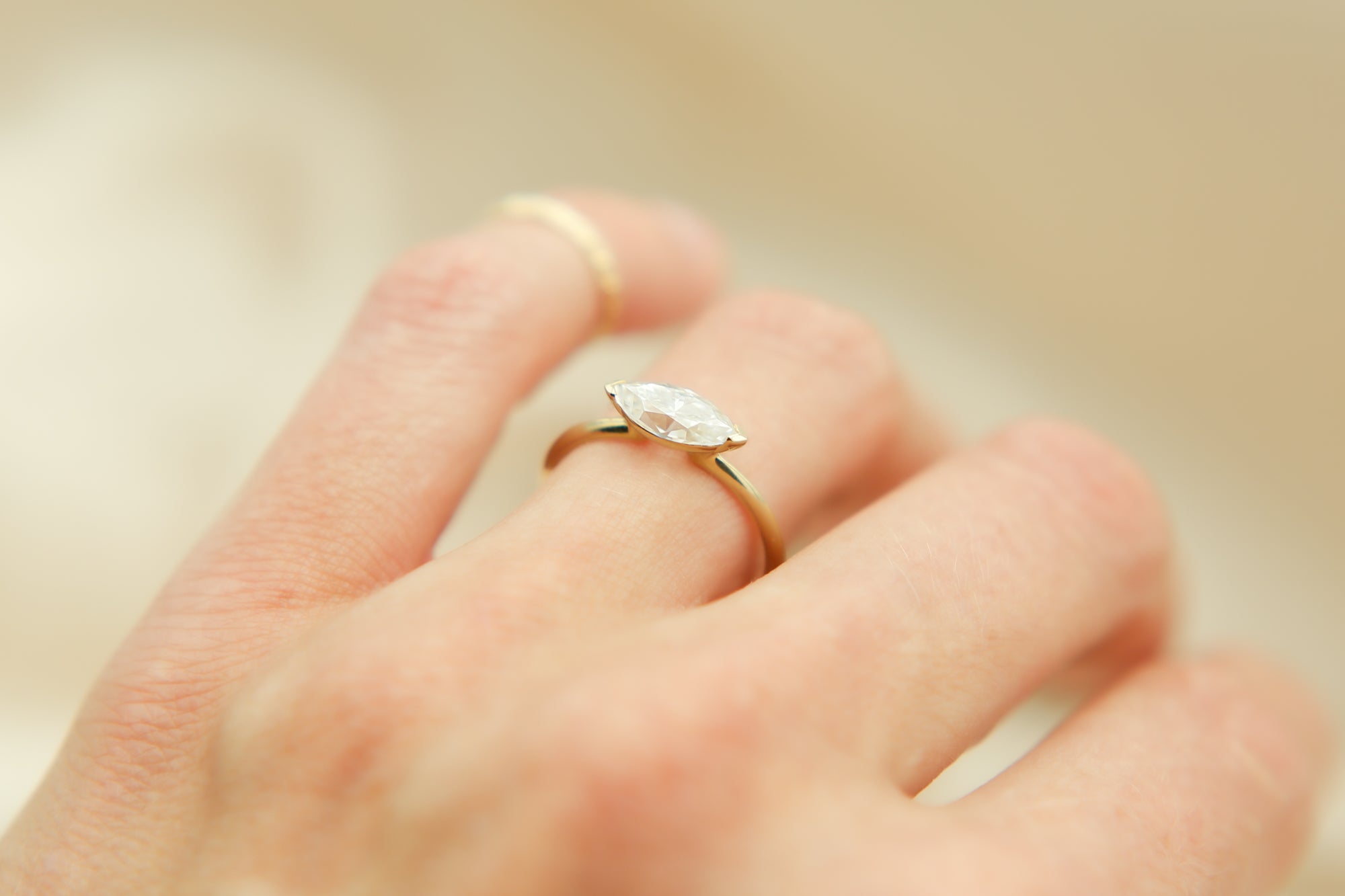 10k East-West Marquise Moissanite Ring