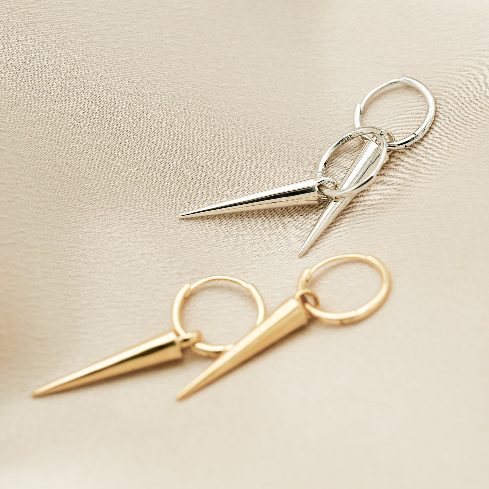 Simple spike earrings on hoops in gold and silver