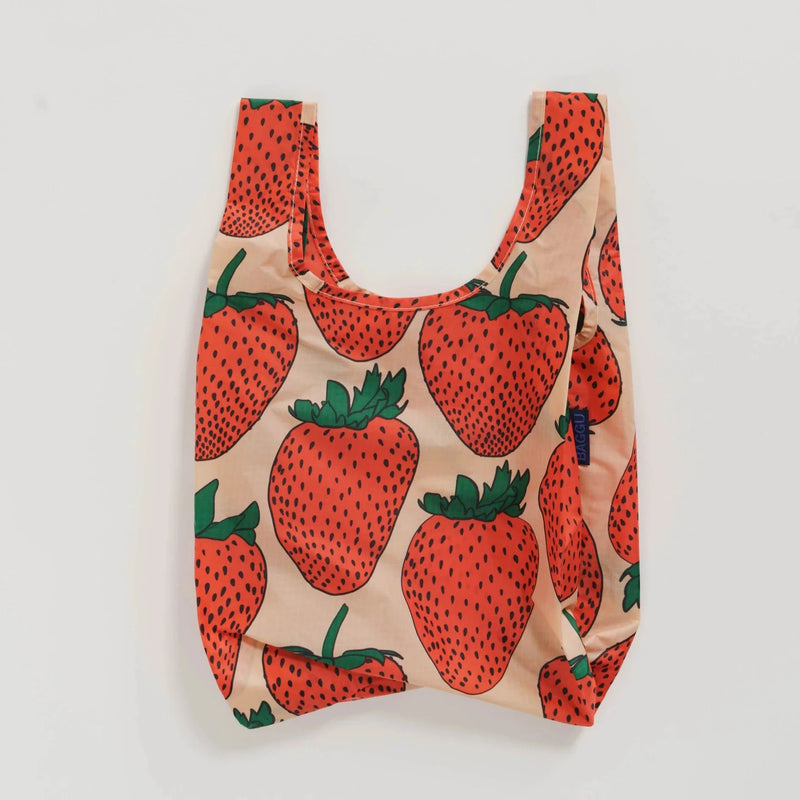 close up of flat lay baby baggu bag. printed with strawberry design 