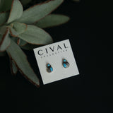 turquoise post earrings with leaf embellishments. 