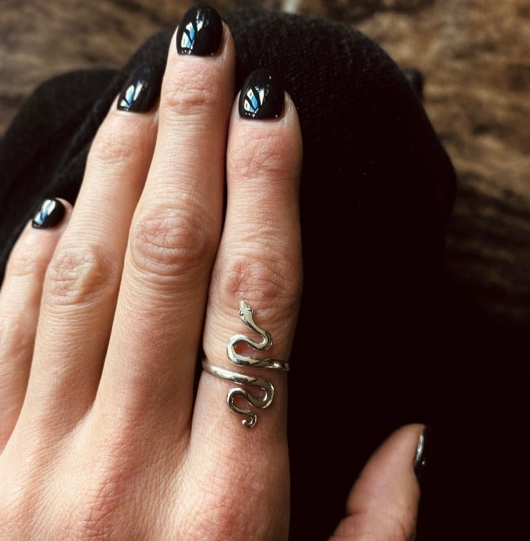 Sterling Silver adjustable snake ring by Milwaukee WI Based Jewelry Designers Cival Collective. Handmade designs made in their studio boutique by local women artists. 