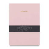 Light pink "Note to Self" journal made by Wit & Delight shown with black informational belly band.